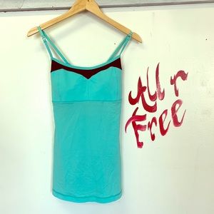 Lululemon Athletica teal and black tank. Medium